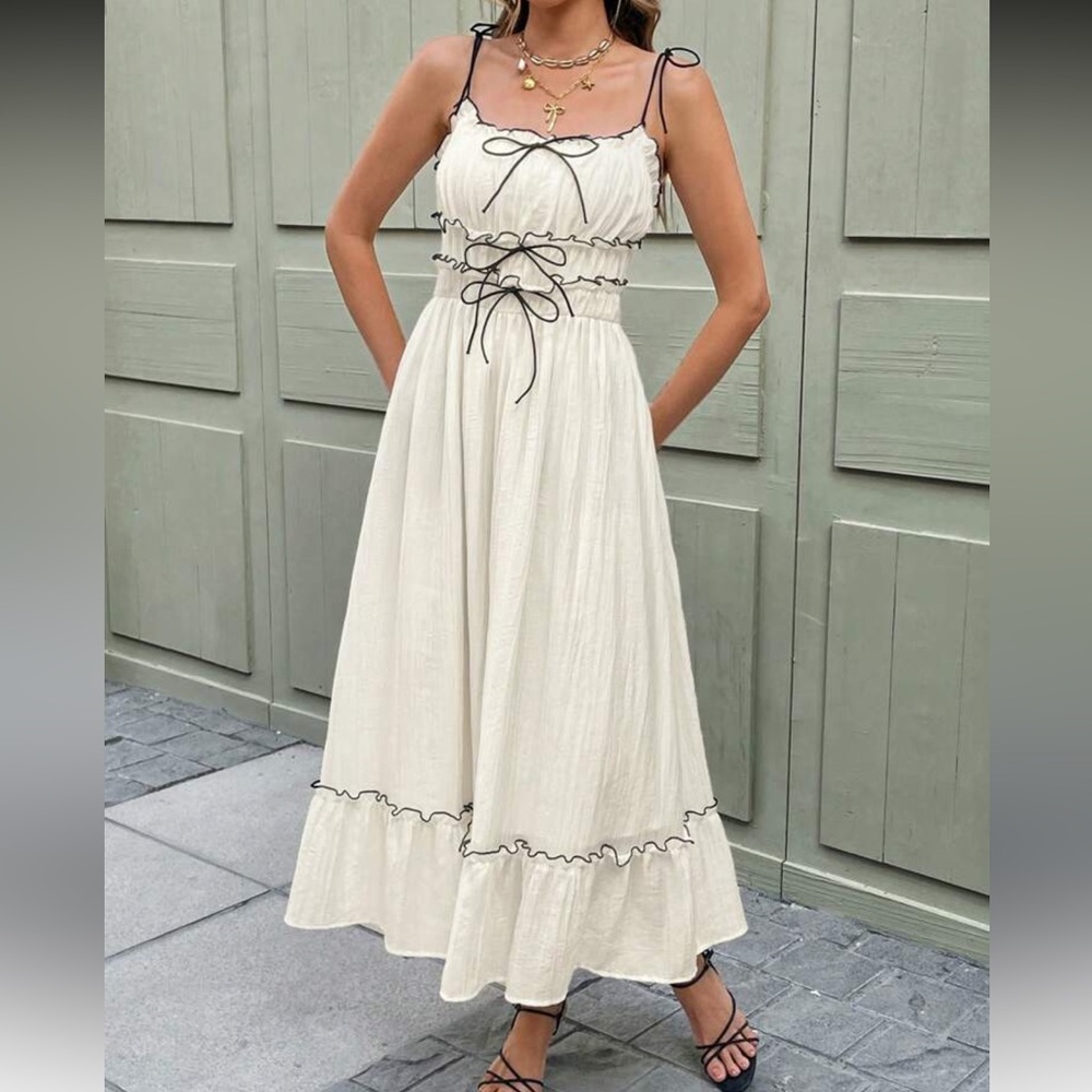 Elegant Cream Dress with Black Accents - Picture 7 of 7